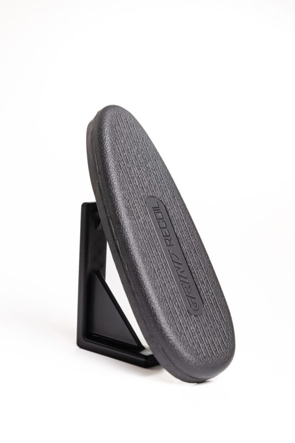 A black and gray phone holder on top of a table.