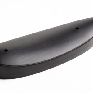 A black plastic object sitting on top of a white surface.