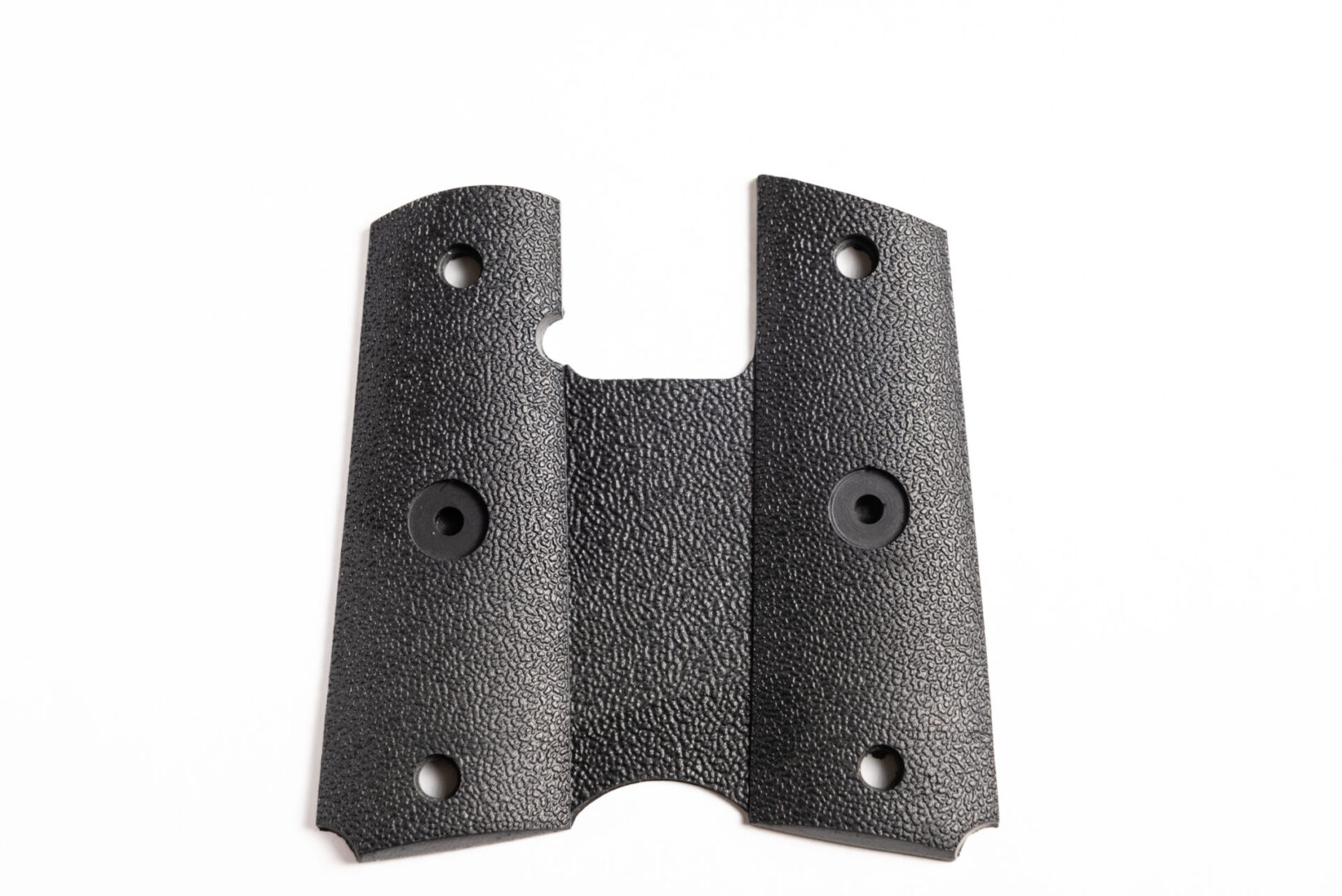 A black piece of metal with holes for mounting.